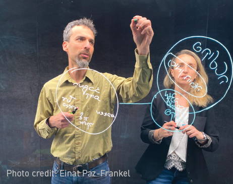 Prof. Ido Roll and Dr. Olga Chuntonov use an electronic light board to record a lecture